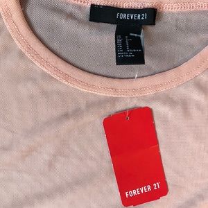 Forever 21 peach colored shortsleeve mesh bodysuit